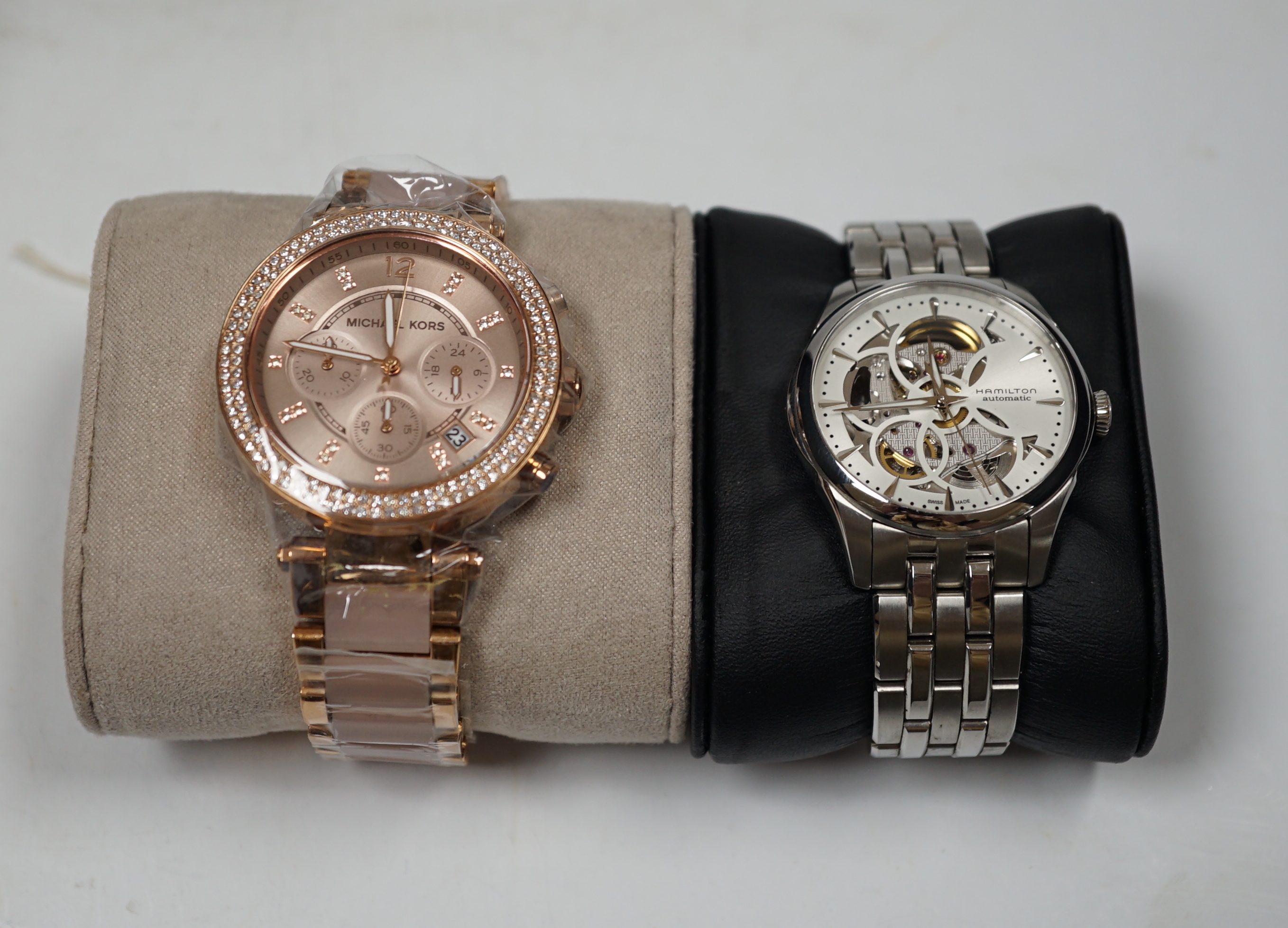 A lady's modern gilt steel and simulated diamond set Michael Kors chronograph quartz watch, with box and pamphlet and a gentleman's modern stainless steel Hamilton automatic wristwatch, with box and pamphlet.
